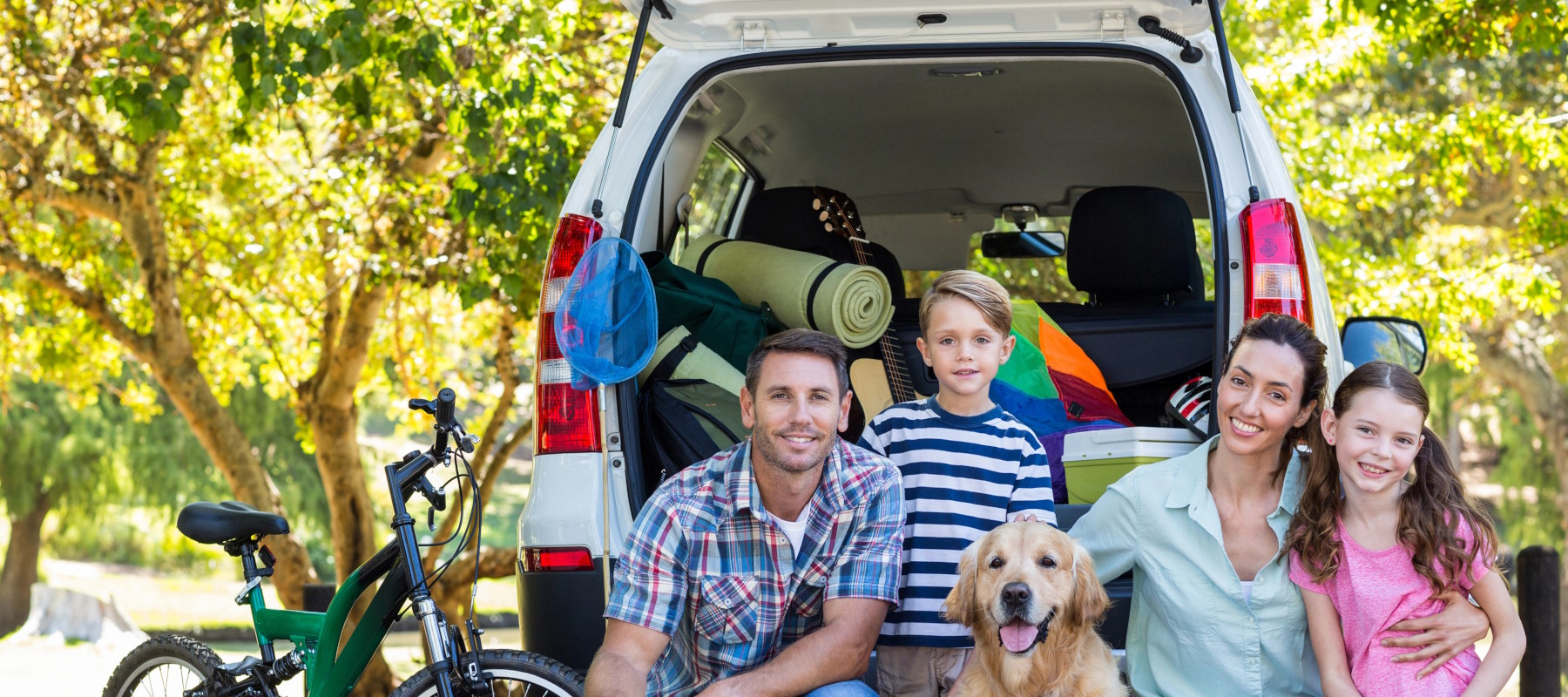 Family in front of new house